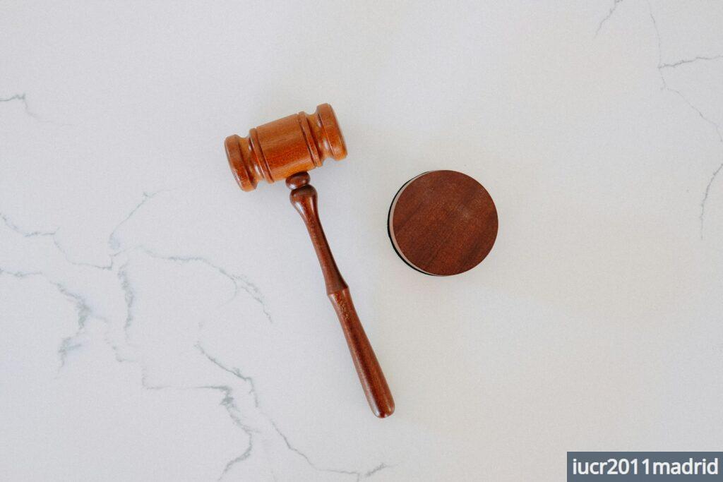 brown wooden smoking pipe on white surface